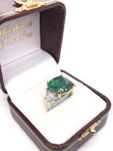 CONTEMPORARY ESTATE 7.88 CARAT EMERALD AND DIAMOND RING