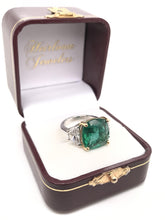 CONTEMPORARY ESTATE 7.88 CARAT EMERALD AND DIAMOND RING